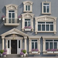 a large house with many windows and flower boxes on the front, along with potted plants