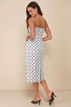 You'll have your crush swooning when you show up wearing the Lulus Flirty Date Black and White Gingham Eyelet Sleeveless Midi Dress! Lightweight woven fabric, with a charming gingham print and lace-like, pierced eyelet embroidery throughout, shapes adjustable spaghetti straps that support a bodice with a straight neckline. Fitted silhouette continues across the waist and into a chic column skirt with a midi hem and a kick pleat at back. Hidden zipper/clasp at back. Fit: This garment fits true to Chic Sleeveless Gingham Dress, Sleeveless Gingham Midi Dress For Day Out, Gingham Sleeveless Midi Dress For Day Out, Sleeveless Gingham Sundress For The Beach, Sleeveless Cotton Midi Dress For Picnic, Fitted Gingham Sleeveless Sundress, Sleeveless Gingham Dress For Day Out, Sleeveless Gingham Beach Dress, Sleeveless Gingham Dress For Vacation