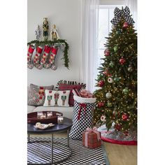 a decorated christmas tree in a living room