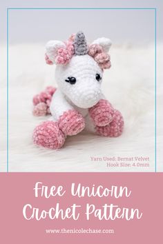 a small crocheted unicorn sitting on top of a white fur covered floor with text overlay that says free unicorn crochet pattern