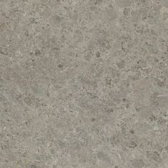 a close up view of the surface of a marbled floor with grey and white colors