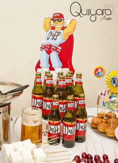 an assortment of food and drinks on a table