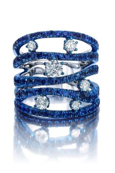 Luxury White Gold Jewelry With Blue Topaz, Luxury Exquisite Sapphire Ring With Diamonds, Luxury Modern White Gold Sapphire Ring, Luxury White Multi-stone Sapphire Ring, Luxury Dazzling Sapphire Ring With Pave Setting, Solitaire Ring Designs, Blue Diamond Jewelry, Cage Ring, High Jewelry Ring