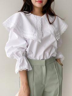 A 100% cotton blouse with wide collar at neckline with embroidered details, balloon puff sleeve and elastic cuff with ruffle look. Model is wearing MINUSEY ONE SIZE. Please allow 5-12 days shipping when in restocking. * MINUSEY ONE SIZE = EU 34-38, US 2-6* 100% Cotton* Dry clean* Made in Korea- Model Height: 173cm/5'8" (US4, EU36) Balloon Puff Sleeve, Blouse Hijab, Blouse Korea, Korean Girl Fashion, Cute Blouses, Hijab Dress, Cotton Blouse, Cotton Blouses, Fashion And Lifestyle