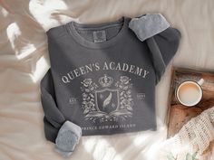 Book Lover sweatshirt Queens Academy shirt Kindred Spirit Bookish sweater Book Nerd Tee Anne Shirley LM Montgomery Back to School shirt ABOUT THIS SWEATSHIRT Comfort Colors® garment-dyed sweatshirt made of 80% ring-spun cotton and 20% polyester. The soft-washed, garment-dyed fabric brings extra coziness and a vintage look to your wardrobe.  -Unisex relaxed fit. -Pre-shrunk during the garment-dye wash process. -Durable material that won't pill. FIT This is a unisex, relaxed fit sweatshirt. You may consider sizing down for a more fitted look. For an oversized fit, I recommend ordering up 1 to 2 sizes. Please review the size chart to ensure you receive the fit you want. Returns are not accepted for ordering the wrong size.  CARE INSTRUCTIONS Turn inside out before washing. Machine wash in col Lm Montgomery, Kindred Spirit, Lover Sweatshirt, Anne Shirley, Kindred Spirits, Bookish Gifts, Workout Sweatshirt, School Shirts, Book Lover