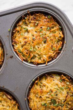 four muffin tins filled with different types of food