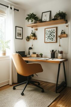 a desk with a chair and some plants on the shelf above it in front of a window