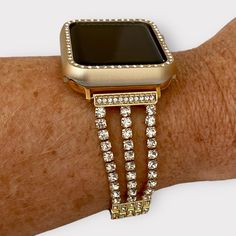 Hurry up and grab your Luxury Rhinestone Apple Watch Band perfect for special events like weddings, graduations, or parties. Available in chic colors: Silver, Gold, Black, and Rose Gold for all the bling-lovers! Comes with a custom-fit watchband for women including a Resizing Tool. Sizes in offer are: 38/40/41MM & 42/44/45/49MM adaptable to Series 1-9, SE & Ultra edition. Each purchase includes a lavish Watch Band and essential resizing tool. Please note, Quality Plus Watchbands are not accounta Diamond Watch With Rhinestones For Party, Luxury Diamond Watch With Rhinestones For Parties, Gold Crystal Diamond Watch For Party, Elegant Diamond Watch With Crystal For Party, Elegant Crystal Diamond Watch For Parties, Elegant Rose Gold Diamond Watch With Rhinestones, Elegant Gold Diamond Watch With Rhinestones, Elegant Gold Diamond Watch Bands, Adjustable Bedazzled Formal Jewelry