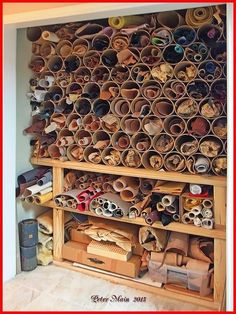 a wall filled with lots of different types of shoes