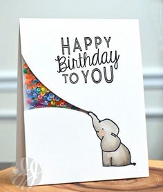 an elephant is blowing bubbles out of its trunk with the words happy birthday to you on it