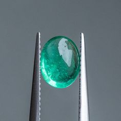 1.76CT OVAL CABOCHON ZAMBIAN EMERALD, NEON GREEN, 8.85X6.81X4.31MM Gia Certified Oval Emerald Gemstone, Gia Certified Oval Emerald, Oval Green Cabochon Gemstones, Green Oval Gemstone Cabochon, Green Gemstone Cabochons, Gia Certified Oval Green Gemstones, Oval Green Gemstones For Jewelry Making, Oval Emerald Gemstone For May Birthstone, Green Cabochon Gemstones For Jewelry Making