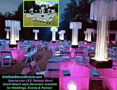 an outdoor event with tables and chairs lit up in pink lighting, surrounded by tall columns