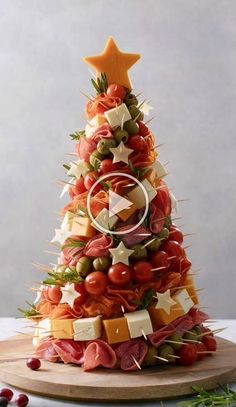 a christmas tree made out of cheese and meats