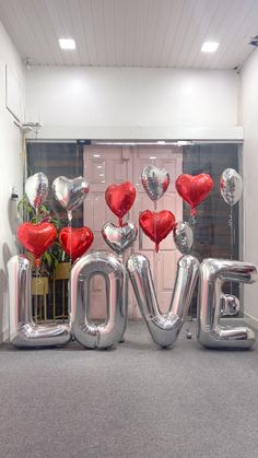 the letters love are made out of balloons