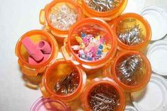 there are many different types of pins and needles in these containers