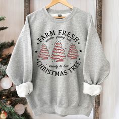 Farm Fresh Christmas Tree Cakes Shirt Christmas Cake Sweatshirt Christmas Tree Farm Shirt Funny Christmas Sweatshirt Christmas Tree Cake Te Suitable for many occasions such as Christmas, Father's Day, Mother's Day, birthday This classic crew-neck sweatshirt is an essential basic item for anyone’s wardrobe. The ribbed cuffs on the sleeves and waist are reinforced, and the high-quality cotton ensure that anyone will enjoy this cuddly and cool sweatshirt for many moons to come. Preshrunk fleece kni Christmas Tree Cakes, Farm Fresh Christmas Trees, Tree Cake, Christmas Tree Cake, Fresh Christmas Trees, Tree Cakes, Xmas Shirts, Tree Farm, Christmas Tree Farm