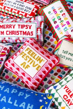 colorful christmas themed candy wrappers with merry tipsy written on them