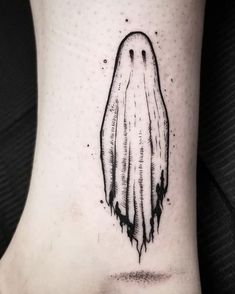 a black and white drawing of a ghost on the ankle