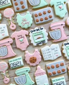 decorated cookies are displayed on a table