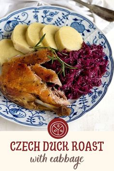 a blue and white plate topped with meat, potatoes and red cabbage next to sliced bananas