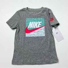 New With Tags Size 4t *All Measurements Are Approximate* Pit To Pit: 11.5 Inches Length: 17 Inches Playful Gray Top With Graphic Print, Nike Summer Gray Tops, Casual Gray Tops For Playtime, Nike Gray Summer Tops, Sporty Graphic Print Tops For Playtime, Nike Playful Tops, Playful Nike Tops For Playtime, Nike Cotton T-shirt In Playful Style, Playful Short Sleeve Nike Tops