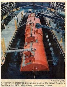 an old photo of a submarine in the water