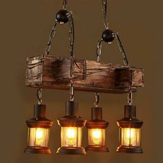 a wooden beam with five lights hanging from it