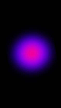 an image of a black background with purple and blue circles in the center, as well as dark space