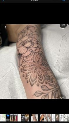 a person's arm with flowers on it and the other side of their arm