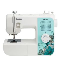 the sewing machine is white and has blue flowers on it's front side,