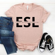 "ESL Teacher Shirt, English Teacher Shirt, English Language Teacher, Second Language, ESL Squad, Maestra Shirt, Efl Ell Esol Team Squad Shirt ▼ PLEASE CHECK THE DESCRIPTION ＊We have Size & Color chart on Listing Photos. ＊The shirts are Unisex size and Straight cut. ＊Not women's cut shirts. ＊If you need Other products, Just message us! (Sweatshirt, V-neck, Youth shirt, Hoodie, Long Sleeve, Tank tops) ▼ BELLA CANVAS TEE & GILDAN TEE SIZE ＊Most women and men customers said these shirts are Ela Teacher Shirts, Teacher Team Shirts History, Esl Teacher Shirts, English Teacher Shirts Designs, English Teacher Tshirts Funny, English Teacher Shirt, Rainbow Tee, School Spirit Wear, Esl Teachers