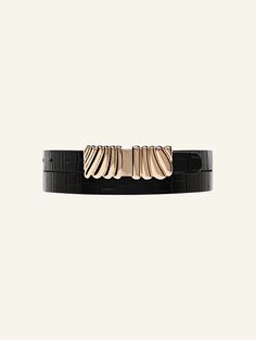 Add a luxurious statement to your everyday look with the Selene Belt. Made with 100% leather with a stone detail and a beautiful custom gold statement buckle. Item Details: Metal buckle detail Adjustment: 8 holes Strap Width: 20mm Genuine Leather Sizing: XS/S: 32'’: Depending on where you like your belt to sit, fits women’s 24, 25, 26, 27 jean size. M/L: 37'': Depending on where you like your belt to sit, fits women’s 27, 28, 29, 30 jean size. Measurement is taken from the buckle point to the third hole. Gift Wrapping Available Each piece comes in its own luxury Love Isabelle Packaging with one gift box per order. Chic Leather Belt With Gold Buckle, Chic Gold Leather Belt Buckles, Modern Belts With Gold Buckle, Chic Black Belt Buckles For Evening, Elegant Leather Belt With Gold Buckle, Luxury Black Belt Buckles With Gold-tone Hardware, Black Leather Belt Buckles With Gold-tone Hardware, Black Belt Buckles With Gold-tone Hardware For Work, Black Belt Buckle With Gold Detail For Formal Occasions