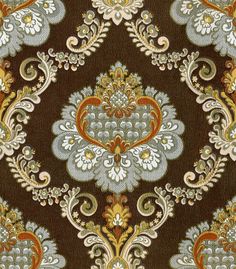 an ornate design on brown fabric with gold and orange accents, in the style of damask