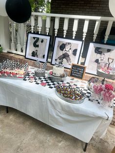 a table with pictures and desserts on it