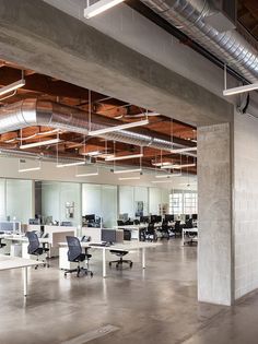 an open office space with desks and chairs