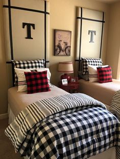 two twin beds with black and white plaid comforters