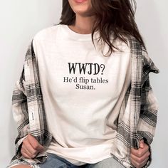 Make a playful statement with our hilarious tee proclaiming 'Jesus Would Flip Tables,' perfect for those with a mischievous sense of humor and a love for irreverent wit. Wear it with a grin and let the world know that even the holiest figures have their breaking points! The soft-washed, garment-dyed fabric brings extra coziness to your wardrobe while the relaxed fit makes it an excellent daily choice. The double-needle stitching throughout the tee makes it highly durable while the lack of side-s Funny Vinyl Shirts, Jesus Flipping Tables, Sassy Shirts For Women, Wwjd Shirt, Funny Christian Tshirt, Tshirts Design Ideas, Funny Christian Shirts, Christian Shirts Designs, Christian Tshirt