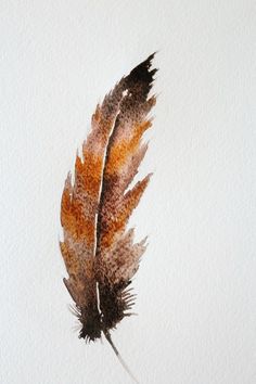 a watercolor painting of a feather on a white paper sheet with brown and orange colors