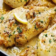 chicken with lemon and parsley in a skillet