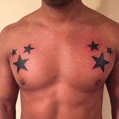 a man with three stars on his chest and one has no shirt to show off