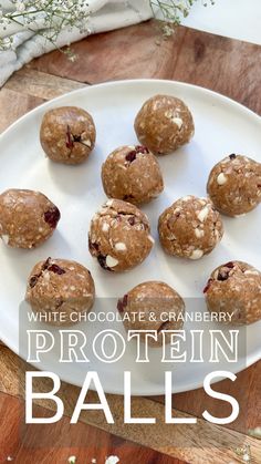 white chocolate and cranberry protein balls on a plate