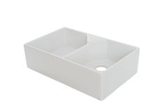 a white square sink with two compartments on the side and an empty bowl in the middle