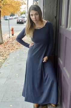 Our Isabella Dress is full of elegance and grace. This full length dress features a flattering empire waistline and lovely scoop neck. The raglan sleeves make the shoulder line a perfect fit for any frame size. Our Isabella dresss is made from our super soft organic French terry lycra fabric so it is warm and cozy with just that perfect little bit of stretch to keep you comfortable. Dressed up or down, this is a beautiful and classic dress. Product details: 95% organic french cotton terry 5% lyc Modest Maxi Dress With Modesty Panel, Fall Maxi Dress With Stretch, Fall Stretch Full-length Maxi Dress, Solid Maxi Dress With Modesty Panel, Full Length Maxi Dress With Side Slits, Fall Maxi Dress With Modesty Panel, Stretch Maxi Dress With Side Slits For Fall, Fall Stretch Maxi Dress With Side Slits, Modest Full-length Maxi Dress For Spring