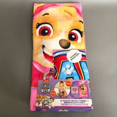 an image of a stuffed animal toy with tags on it's back and its packaging