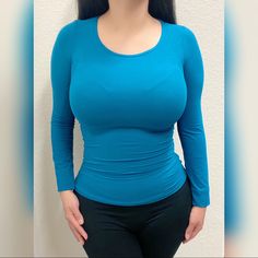 Round Neck Stretch Knit Long Sleeve Fitted Top. 92% Polyester 8% Spandex Wearing A Size Small. Blue Seamless Elastane Tops, High Stretch Blue Elastane Tops, Blue Stretch Seamless Tops, Long Sleeve Fitted Top, Long Sleeve Peasant Top, Lavender Shirt, Tommy Hilfiger Long Sleeve, Black Mock Neck, Teal Top