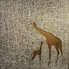 an image of a giraffe and its baby in the background with lines drawn on it