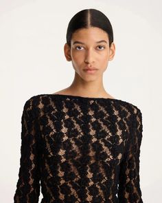 FINAL SALE The Lace Boat Neck Top in Black by Rohe is a long sleeve, sheer top crafted in an exclusive lace crafted from the Italian mill Pizval. 68% Cotton 23% Polyamide 9% Elastane #412-20-160 Top Transparente, Haut Transparent, Boat Neck Top, Lace Crafts, Wavy Design, Winter Capsule Wardrobe, Boat Neck Tops, Sheer Top, Stretch Lace