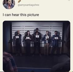 a group of people standing next to each other in front of a mugshot wall