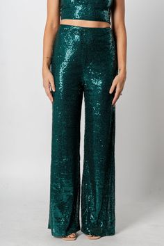 Sequin flare pants dark shiny turquoise | Lush Fashion Lounge: women's boutique pants, boutique women's pants, affordable boutique pants, women's fashion pants Bling Outfits, Silver Trousers, Sequin Flare Pants, Glitter Pants, Sequin Pants, Holiday Apparel, Loose Trousers, Trouser Style, Women's Boutique