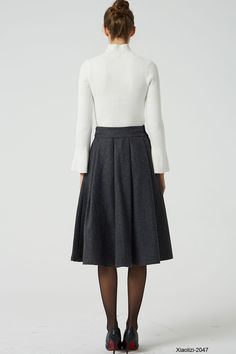 Classic A-line Pleated Skirt For Fall, Fitted Gray Pleated Skirt, Elegant Gray Pleated Skirt, Elegant Gray Skirt For The Office, Elegant Gray Pleated Bottoms, Elegant Gray Skirt For Office, Elegant Wool Pleated Skirt For Work, Elegant Gray Office Skirt, Chic Gray Formal Skirt